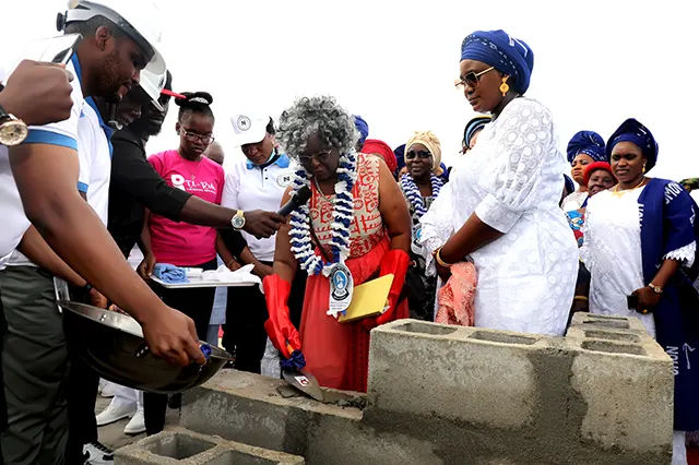Former NOWA National President, Mrs Margret Koshoni laying the foundation of the proposed NOWA International Market, Borokiri, Port Harcourt, Rivers State