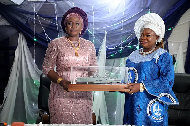 New NOWA National President, Mrs. Ijeoma Ogalla and the immediate past President, Hajiya (Dr.) Aisha Nana Gambo Handing Over Symbol of Office