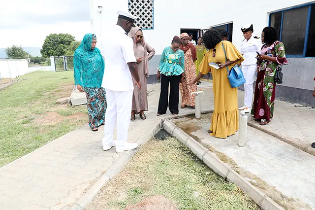 NOWA National President, Mrs. Ijeoma Ogalla, represented by NOWA Vice President, Mrs. Zainab Akpan, inspecting water supply in the school, during her visit to NOWA Schools, Karshi